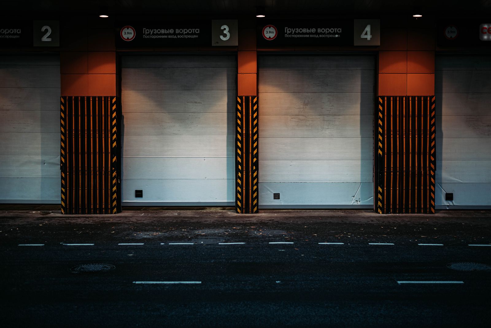 Commercial storefront with security gate on a city street