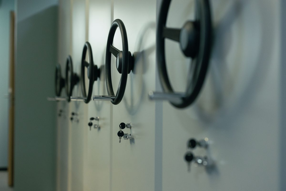 Row of secure safe doors with handles and key locks in a New York City facility