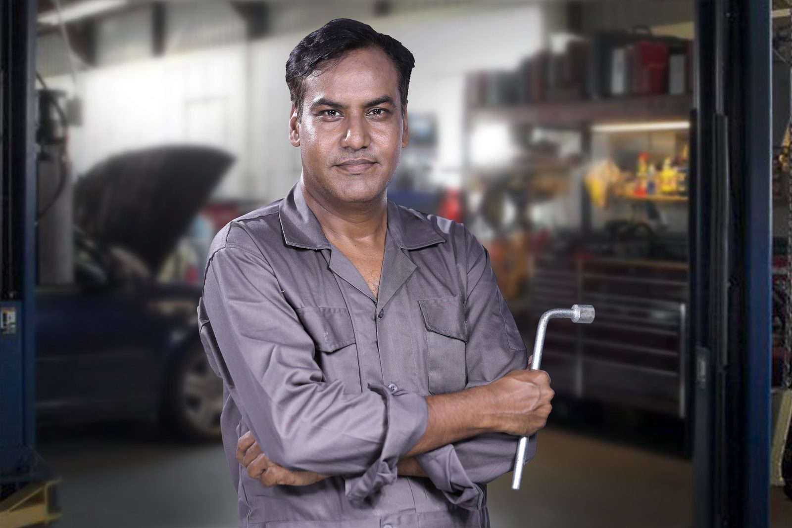 Experienced locksmith professional in uniform representing the Emergency Locksmith NY team